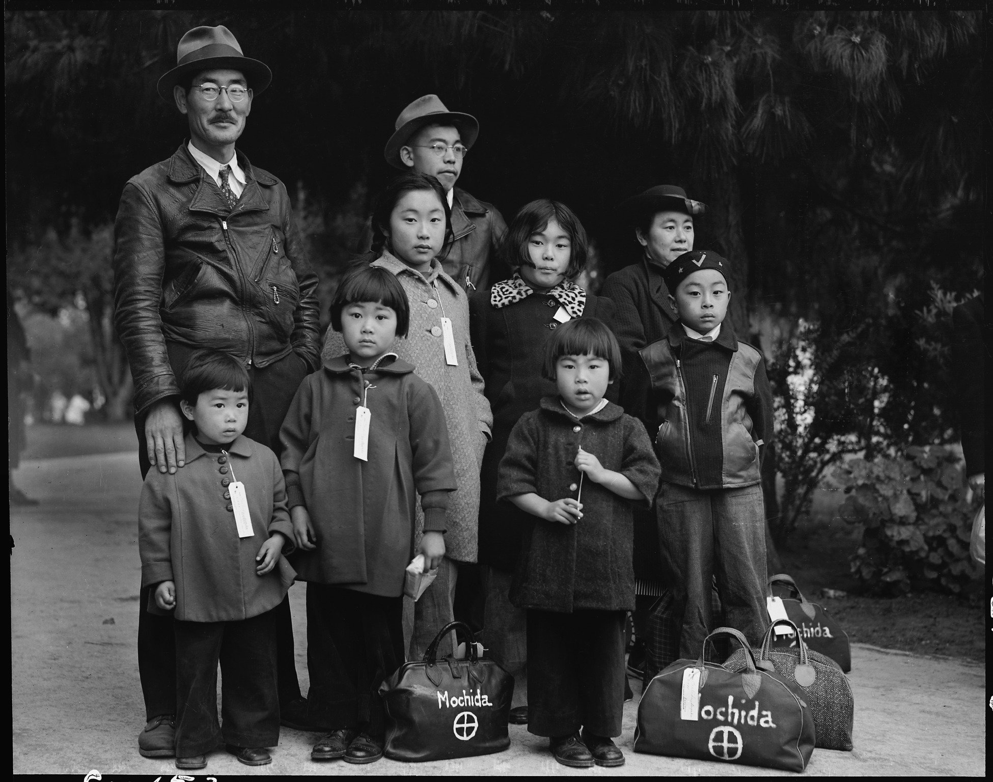 The Machida family waited for transportation in Hayward, California, in May 1942. (National Archives) 